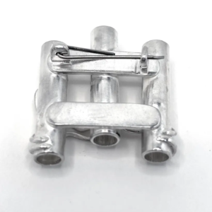 Back of a handmade sterling silver brooch showing the pin fastening and the open ends of three tube vases