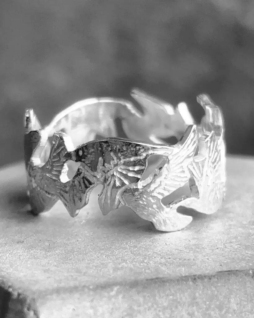 Sterling Silver Starling Statement Ring, Saw-Pierced Flock Band Wide sterling silver statement ring with a saw-pierced flock of starlings in flight cut around the whole band