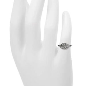 Artisan handmade sterling silver Orbit Cluster ring featuring hand-formed organic spheres inside an openwork marquise frame, shown on a mannequin hand.