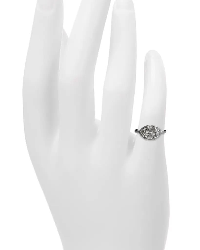 Artisan handmade sterling silver Orbit Cluster ring featuring hand-formed organic spheres inside an openwork marquise frame, shown on a mannequin hand.