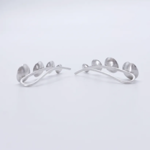 Back view of 925 sterling silver ear climber earrings, showing the curved wire which is inserted into the ear.